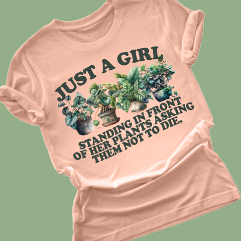 Just a girl standing in front of her plants asking them not to die
